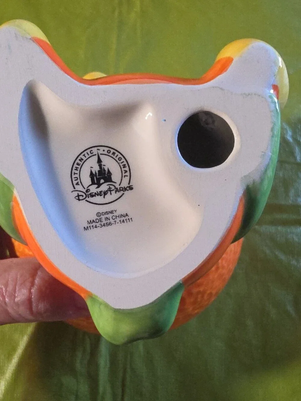 Disney Orange Bird Figurine with Yellow Beak and Green Leaf Detail